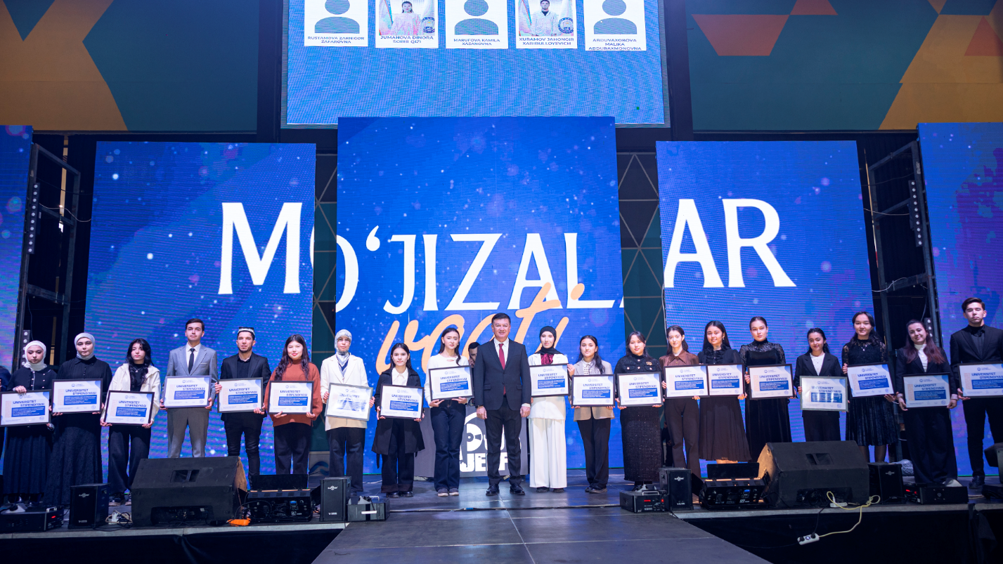 Grant recipients on stage at Mo'jizalar event
